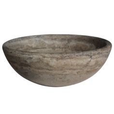 a stone bowl is shown on a white background