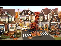 a large group of houses with autumn decorations