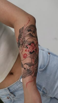 a woman with a tattoo on her arm