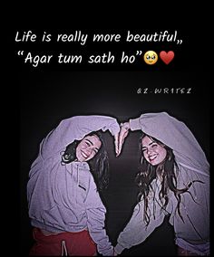 two young women standing next to each other in front of a black background with the words life is really more beautiful