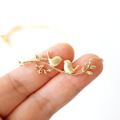 "Beautiful and lovely birds on the branch necklace. Made of gold birds on the branch pendant with a skinny gold plated brass chain. Soft and simple. Great for gift, everyday or special occasion. Your item will ship in a gift box. Please feel free to contact me if you have any question. ♥ Length 14\" - 18\" chain ♥ Pendant 1/2\" x 1 3/4\" ♥ Gold plated over brass ♥ See more Rudiana Accessories Rudiana.etsy.com" Gold Bird Necklace, Mountain Necklace, Branch Necklace, Gold Jewelry Simple, Bird Necklace, Bird Pendant, Gold Necklace Designs, Bird Jewelry, Fancy Jewelry