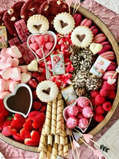 valentine's day treats arranged in a bowl on a table