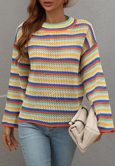 he EMES SHOP sweater is detailed with a beautiful colorful striped pattern. Features a round neck line. drop shoulder. long sleeves. crochet knit material. and loose fit. Pair it with cuffed jeans and sneakers for a cute look.MATERIAL:100% AcrylicMEASUREMENTS: Product Length 23"-24.5"in 4-6-Small | Waist: 25"-26.5"in | Chest: 33"-34.5"in 6-8-Medium | Waist: 26.5"-28"in | Chest: 34.5"-36"in 8-10-Large | Waist: 28"-29.5"in | Chest: 36"-37.5"in 10-12-X-Large | Waist: 29.5"-31"in | Chest: 37.5"-39"i Oversized Multicolor Sweater With Ribbed Cuffs, Casual Multicolor Sweater With Ribbed Cuffs, Casual Striped Knitted Sweater, Oversized Striped Color Block Sweater, Trendy Striped Knitted Sweater, Casual Colorful Fall Sweater, Striped Crew Neck Sweater For Spring, Colorful Color Block Crew Neck Sweater, Trendy Multicolor Sweater With Ribbed Cuffs