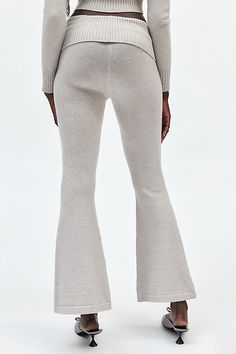 Lioness pant in a super cozy knit designed to be your new favorite. Features a mid-rise, ribbed knit foldover waistband and flared leg for a look that’s casual & chic. Features Lioness Muse knit pant Flare sweatpant Soft & stretchy knit Mid-rise with wide foldover waistband Slim fit from waist to calves Flare leg Full length Easy pull-on style Content + Care 49% Viscose, 28% polyester, 23% nylon Machine wash Imported Size + Fit Model in Grey is 5’8" and wearing size Small Measurements taken from Ribbed Stretch Wide-leg Bottoms, Non-stretch Flared Hem Bottoms For Fall, Chic Ribbed Flare Bottoms, Ribbed Flare Pants For Loungewear, Flare Ribbed Pants For Loungewear, Fall Ribbed Wide-leg Bottoms, Full Length Ribbed Bottoms For Fall, Non-stretch Flare Bottoms For Winter, Flare Bottoms For Fall Loungewear