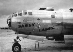 an old black and white photo of a sassy lassy airplane