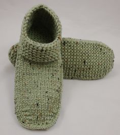 Knit with a 100% acrylic yarn in a light frosty apple green tweed with brown and black flecks. The unique heel hugging design helps keep these slippers on. Knit with a double strand of yarn throughout so these are quite thick and sturdy.  Sole measures 8 1/4 "  Size: Childrens size 10 to 12 Length: 8 1/4" Circumference around instep:  7" Height at back of heel: 3 "  Please take a moment to measure the recipient's foot to ensure the proper sizing and fit.  All of my items are made with care by me Boys Slippers, Unique Heels, Green Tweed, Knit Shoes, Slipper Shoes, Apple Green, Boys Shoes, Acrylic Yarn, Lay Flat