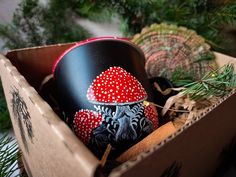 a wooden box filled with lots of different types of mushrooms and other things in it