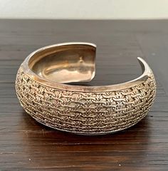 "A heavy, classic silver cuff bracelet made of sterling wire woven into a unique basket weave design. Take a look at the close-up photos to see the fine craftsmanship of this piece!    This bracelet is marked 925 for sterling, and weighs a substantial 45 grams. It measures 6.25\" with a cuff gap of 1\" (for a total circumference of 7.25\", and would best fit a wrist around 6\" to 6.5\" in circumference. This piece has a subtle patina that enhances the woven design. Condition: Overall this cuff i Elegant Engraved Braided Bangle Bracelet, Traditional Woven Bangle Jewelry, Traditional Woven Bangle, Traditional Silver Braided Bangle Bracelet, Elegant Handwoven Silver Jewelry, Vintage Wine Glasses, Wire Cuff, Cuff Bracelets Handmade, 925 Silver Bracelet