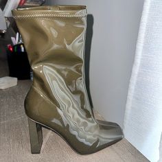 Faux Leather Ankle Boot Never Worn Trendy Synthetic Heeled Boots With Square Toe, Green Synthetic Heels For Fall, Green Ankle-high Synthetic Boots, Green High Heel Synthetic Boots, Trendy Green Square Toe Boots, Green Faux Leather Ankle-high Boots, Green Boots For Party, Medium Width, Chic Green Boots Medium Width, Chic Green Square Toe Boots