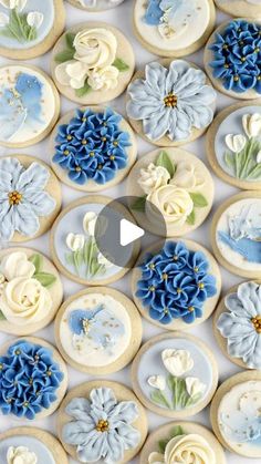 decorated cookies with blue and white flowers on them