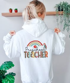 "Preschool Teacher Hoodie, Preschool Hoodie, Pre-K Teacher Teacher Hoodie, Cute Teacher Hoodie, Preschool Teacher Shirt    Hi! Welcome to✨Northstar Sweatshirt &Hoodies✨ ✨As the weather gets colder, you want clothes that keep you and your body warm. Here, Northstar Sweatshirt &Hoodies is ready to keep you warm with its unique designs. These soft and cotton sweatshirts and hoodies can be combined with anything.✨ ✨Product Features✨ 👉Medium-heavy fabric (8.0 oz/yd² (271.25 g/m 👉Loose fit 👉Runs tr Preschool Teacher Tshirts, Preschool Sweatshirt, Teacher Hoodie Designs, Pre K Shirts For Teachers, Preschool Teacher Sweatshirt, Prek Teacher Shirts, Teacher Clipboard, Preschool Teacher Shirts, Preschool Teacher