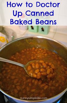 a pot full of baked beans with the words how to doctor up canned baked beans