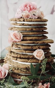 a stack of cookies with flowers on top