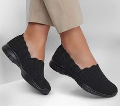 Make the call for sleek versatile style in the Skechers Seager - Stat. This pull-on features a Stretch Fit Skech Knit mesh fabric upper, plus a Skechers Air-Cooled Memory Foam cushioned insole. | Skechers Women's Seager - Stat Slip-On Shoes | Medium Width | Skechers Air-Cooled Memory Foam cushioned comfort insole | Breathable Skech Knit mesh fabric upper with scalloped collar | Stretch Fit design for sock-like comfort | Crafted with 100% vegan materials | Pull-on casual comfort design | Shock-ab Skechers Shoes Women Outfit, Skechers Black Shoes, Shoes Women Outfit, Skechers Shoes Women, Vegan Design, Scalloped Collar, Skechers Memory Foam, Skechers Relaxed Fit, Knit Mesh