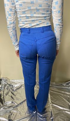 "These are a cool pair of blue Carpenter style work wear pants from the 1980s. There is a faded section in one of the legs but they are overall in pretty good shape. They have absolutely no stretching capabilities, nor do they have a tag for sizing, so please compare your measurements with those below. All measurements are taken flat then doubled for total circumference. Waist: 27\" Hips: 40\" Length:41\" Inseam:31\"" Carpenter Work, Womens Trousers, Womens Pants, T Shirt Photo, Floral Jumpsuit, The 1980s, Work Pants, Pretty Good, Cincinnati