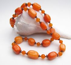 Orange quartz beaded necklace. Beautiful fall shades.  This necklace measures 20 inches.  The beads are accented by copper beads. Strung on heavy tiger wire for durability and double crimped.  Copper lobster closure. Handcrafted by Self Representing Artist jewelry Design #2601. Thank you for checking out this item!  Many more items for sale in my shop.  New items added regularly so be sure to check back often! Matching bracelet and earrings are listed in separate auctions. https://www.etsy.com/s Orange Quartz, Artist Jewelry, Orange Jewelry, Matching Bracelet, Jewerly Diy, Matching Bracelets, Artistic Jewelry, Items For Sale, Chain Styles