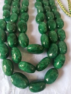 AAA 734 Carat Emerald beryl Oval Shape Fine Quality Smooth Beads With Adjustable Cord Necklace Stone : Emerald beryl Shape :- Oval Size :-6x8 - 12x17mm length - 18 inch, 3 line strings Weight :- 734 carat Polish :- Handmade color - green It is known as the 'love stone' as the message it emits is the strong vibration of unconditional love, joy, warmth and healing. As quartz crystals are profound amplifiers of energy, it may help to kindle happiness, love, romantic feelings and sensuality. It is g Romantic Feelings, Carnelian Bracelet, Necklace Stone, Love Romantic, Multi Sapphire, Oval Beads, 108 Bead, Quartz Crystals, Little Flowers