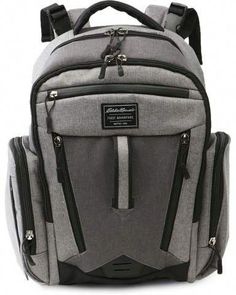 a grey backpack with black zippers on the front and side pockets, sitting against a white background