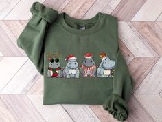 Hippopotamus Christmas Sweatshirt, Retro Hippo Christmas Light Sweatshirt, Hippo Lover Xmas Shirt, Hippo Christmas Crewneck, Christmas Gifts From the dropdown boxes next to the image, select the size and color of your t-shirt. Please keep in mind that actual colors can slightly vary from the screen colors. Choose the quantity. Hit ADD TO CART. Repeat previous steps for adding more shirt for your family and loved ones. When you are done, proceed to the checkout. AND now your order is complete T-shirt Care? DO Inside out before wash, DO warm/cold machine wash DO NOT bleach, DO NOT dry clean, DO NOT iron directly onto the design The shirts we print are Bella Canvas, Gildan and Next Level. Your orders are sent according to stock status. *We are not responsible for USPS DELAYS or LOST packages! Aesthetic Hoodies, Coffee Sweatshirt, Disney Sweatshirts, Coffee Shirts, Sweatshirt Christmas, Holiday Sweater, Christmas Coffee, Coffee Lover Gifts, Christmas 2023