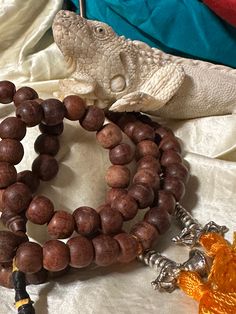 Tibetan ROSEWOOD PRAYER MALA 108 Handmade Vintage Rosewood - Etsy Spiritual Brown Wooden Beaded Bracelets, Spiritual Brown Beaded Bracelets With Wooden Beads, Brown Beaded Holistic Mala, Holistic Brown Beaded Mala, Traditional Brown Beaded Bracelet With Polished Beads, Brown Beaded Mala For Festivals, Brown 8mm Beads Mala For Festival, Brown Mala With 8mm Beads For Festival, Brown Beaded Bracelets For Meditation And Festivals