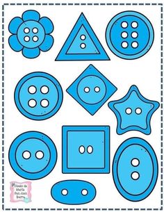 blue buttons and shapes cut out on a white background