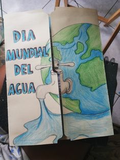 a child's drawing of a water faucet and the words dia mundoal del agua