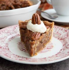 a slice of pecan pie with whipped cream on top