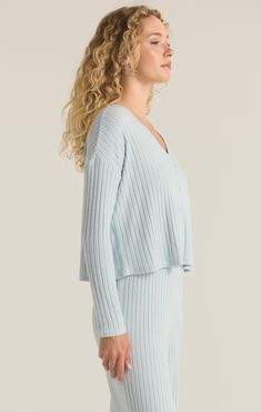 Slip into the effortless comfort of our relaxed fit cardigan top, made from silky rib fabric for a luxurious feel. This boxy, cropped piece features a V-neck, button front, and long sleeves, creating a casual yet chic look perfect for layering or wearing alone. Rib Fabric, Fitted Cardigan, Long Sleeve Kids, Soft Cardigan, Blue Cardigan, Cardigan Top, Midi Maxi Dress, Short Pajama Set, Sleeve Cardigan