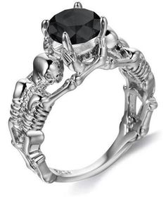 This skull and crossbones ring has a large diamond worn by two skeletons. This diamond revered by its devotees will make you meet many successes. Stainless Steel 316L : does not blacken, resistant to chlorine Zirconium crystals: shine like real diamonds No form of discomfort on your skin Neat details Weight: 20gr STANDARD SHIPPING OFFERED ☠️ Refer to our MEASURING GUIDE if you're not sure what size to order.. ☠️👉Discover our collection Skull Rings Goth Biker, Skeleton Ring, Artisan Rings, Gothic Rings, Rock Chic, Ring Sale, Rings Engagement, Ring Pendant Necklace, Unisex Ring