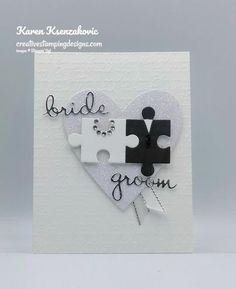 a white card with two pieces of puzzle in the shape of a heart that says bride and groom