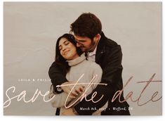 a couple hugging each other with the words save the date written in pink on them