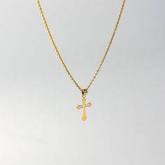 Proclaim your love and believe in Christianity in the most sophisticated way. Highlight the power of your faith in Jesus Christ and His sacrifice through this 14K solid gold cross pendant. The minimalist cross pendant exquisitely represents the long-standing Christian faith through its elegant finish. Finely cut edges showcase utmost precision, giving the cross pendant a neat appeal that is captivating to the eyes. 100% tarnish-free, this solid gold pendant will shine as radiant as your faith in Spiritual 14k Gold Cross Necklace, Tarnish-resistant Yellow Gold Cross Necklace, Classic Gold Crucifix Cross Necklace, Yellow Gold Cross Necklace, Golden Cross, Catholic Cross, Gold Cross Pendant, Necklace Charm, Gold Cross