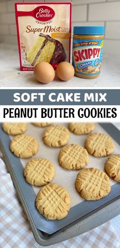 cake mix peanut butter cookies on a baking sheet and in the background is a cookie tin