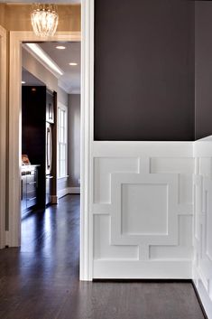 an instagramted photo of a house with black walls and white trim on the door