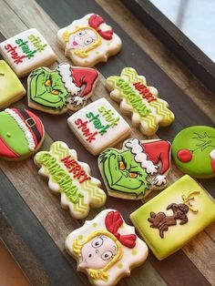 some decorated cookies are sitting on a table