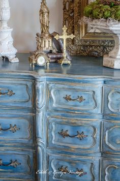 an old dresser is painted blue and has gold accents on it, with the words how to paint a faux finish