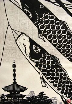 two black and white fish in front of a pagoda