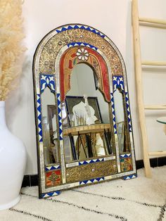 a mirror sitting on top of a floor next to a vase Indian Room Decor Bedroom Designs, Turkish Mirror, Marakesh Mirror, Full Length Mirror Gold, Peacock Feather Mirror, Moroccan Arch, Morrocan Wall Mirror, Mirror Unique, Mirror Floor