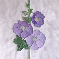 purple flowers on a white background with green leaves