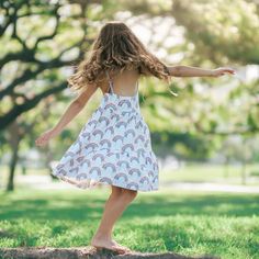 For dancing and twirling and every cuddle along the way, you and your little one will adore our Ruffle Dress. This style features an adorable criss-cross back and tiered ruffles along the skirt. And with fabric that’s both silky-smooth and stretchy, they’re easy to get on, take off, and even easier to love—helping you create beautiful memories with your ‘ohana. Cute Tiered Dress With Smocked Back, Cute Summer Dresses With Tiered Skirt, Cute Ruffle Dress With Ruffle Hem For Beach, Cute Ruffle Hem Dress For Beach, Cute Ruffle Hem Dress For The Beach, Cute Sleeveless Tiered Ruffle Dress, Cute Sleeveless Tiered Dress With Ruffles, Playful Spring Twirl Dress With Ruffle Hem, Playful Tiered Dress With Ruffle Hem