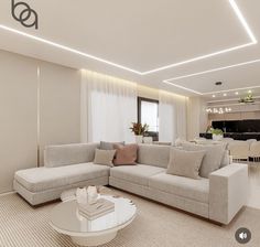 a living room filled with furniture and white walls