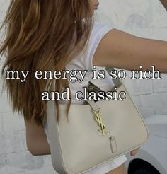 a woman holding a white purse with the words my energy is so rich and classic