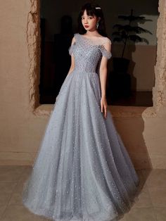 Fairytale chic blue gray prom dress 2020 Fabric:Glitter tulle Color:Dusty blue,Gray,Red,Pink(All color available ) Size:All sizes available Waist:Natural Embellishment:Pearls Fully Lined: Yes Built-in Bra: Yes Body Shape: All types. Net Weight:1.5kgShipping Weight:2kg Country of origin: China Making Time:20-25 days Gray Prom Dress, Prom Event, Grey Prom Dress, Fabric Glitter, Event Dress, Red Prom, Dresses 2020, Event Dresses, Couture Dresses