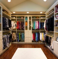 the closet is full of clothes and other items