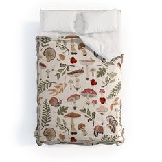 an image of a bed with mushrooms and leaves printed on the comforter cover set