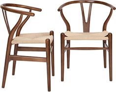 two wooden chairs sitting next to each other