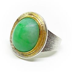 "Awesome Sterling silver and 18K Gold ring (bezel) with a beautiful bicolour Jadeite (Jade) cabochon size 15,5 mm x 12,5 mm (13.4 quilates). High quality handmade 18K Gold and Sterling silver ring. Ring size: USA: 61/2 , DE: 53 (16,8 mm). ESP: 13, UK: N, FR: 53, IT: 13. If it's not the required size, maybe we can adapt to. Please ask for. Also we can make an order custom ring for you. If you need more information about the dimensions or more images to improve the idea of how it is or how it can be, do not hesitate to contact me.  You will see the link on the main page \"Contact the store owner\"." Modern Green Cabochon Rings, Silver Chrysoprase Cabochon Emerald Ring, Handmade Elegant Chrysoprase Ring, Store Owner, Ring Bezel, Personalized Gift Wrap, Cabochon Ring, 18k Gold Ring, Custom Ring