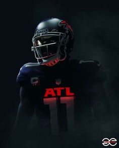 a football player wearing a black uniform with red lettering on the chest and helmet, in front of a dark background