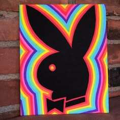 a painting of a rabbit with a bow tie on it's head in front of a brick wall