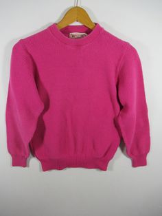 "Vintage 80s American Eagle Pink Sweater, Women M, Made in USA Approx. 19\" pit to pit and 22\" length. Discoloration on one sleeve and on the front. Loose thread area on the bottom hem." Retro Pink Sweater For Fall, Vintage Pink Sweater For Spring, American Vintage Sweater, Retro Pink Long Sleeve Sweater, Pink Vintage Spring Sweater, 80's Clothes, Eighties Fashion, 80s Accessories, Hot Pink Sweater